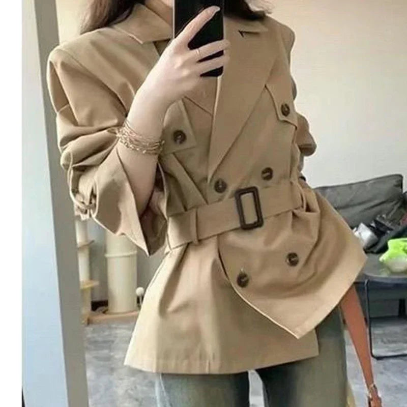 Korean advanced windbreaker women's autumn and winter new fashion temperament waist slim double-breasted lapel long coat.